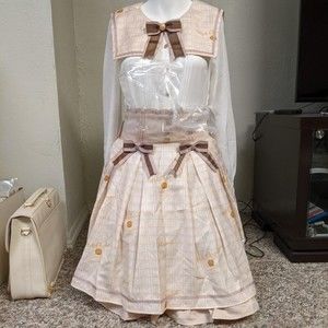 Amavel from manufacturer Melt Chocolate Blouse + Skirt Set Apricot / White